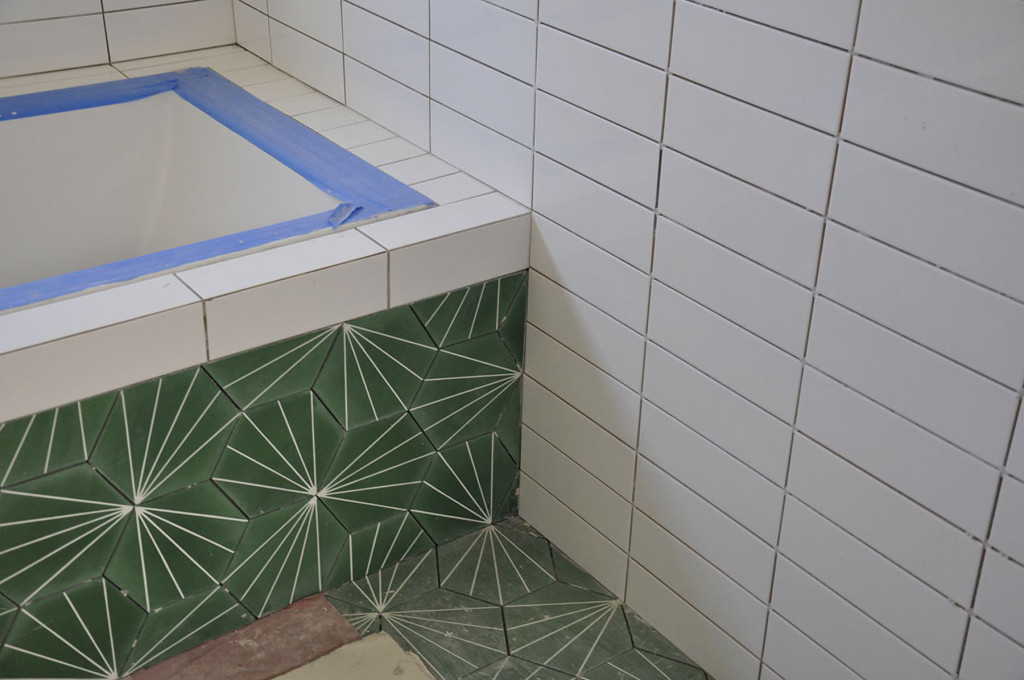 'Dandelion' Moroccan cement tile installed in the guest bath.